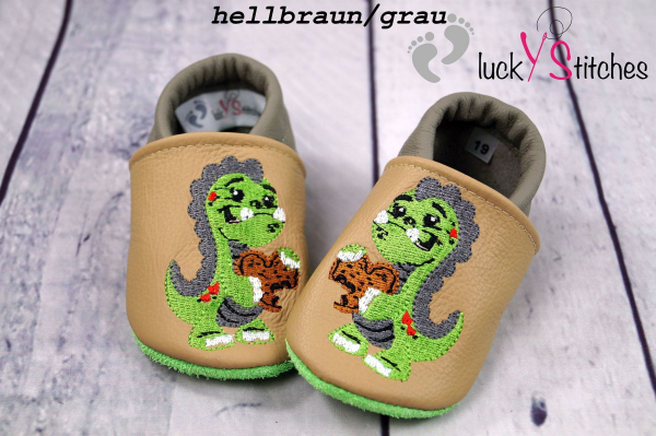 Lederpuschen Dino mit Keks